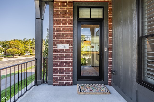 456 Monon Way Dr, Carmel, IN 46032 - view of exterior entry featuring covered porch and brick siding