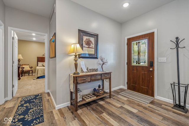 entrance foyer with hardwood / wood-style floors