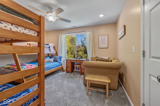 carpeted bedroom featuring ceiling fan