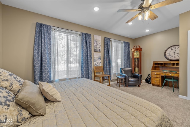 bedroom with ceiling fan and carpet