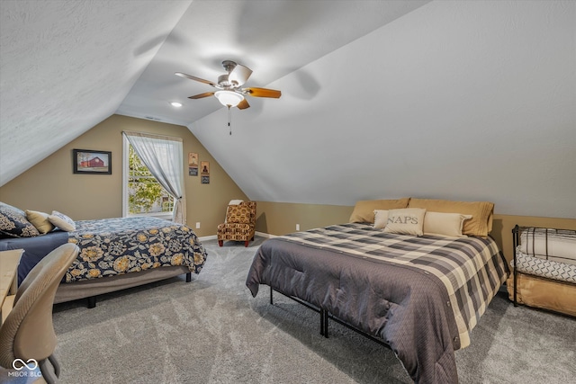 bedroom with carpet, vaulted ceiling, and ceiling fan