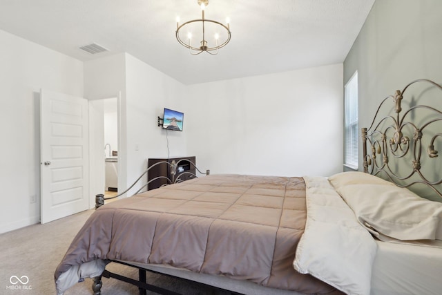 10008 Sundley Dr, Indianapolis, IN 46239 - bedroom with baseboards, a notable chandelier, visible vents, and carpet