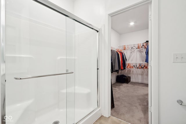 10008 Sundley Dr, Indianapolis, IN 46239 - full bathroom with a stall shower and a walk in closet