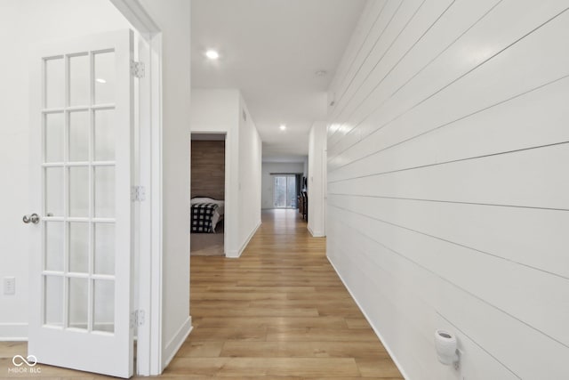 10008 Sundley Dr, Indianapolis, IN 46239 - hallway with light wood finished floors, baseboards, and recessed lighting
