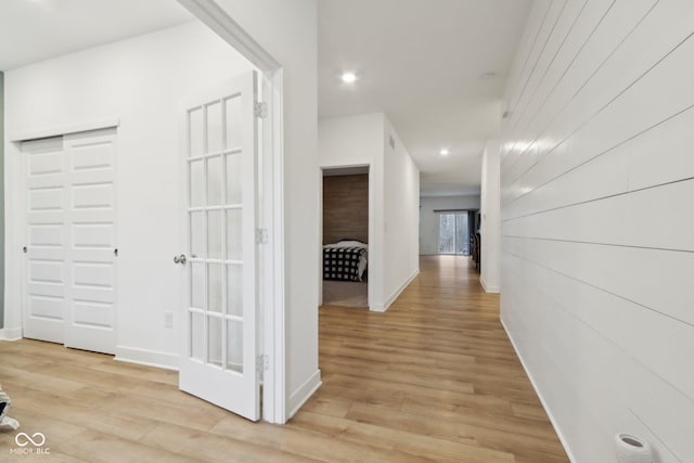 10008 Sundley Dr, Indianapolis, IN 46239 - hall with light wood-style flooring, baseboards, and recessed lighting
