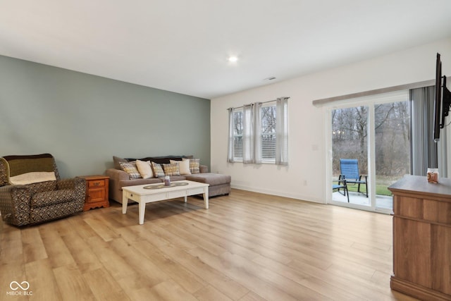 10008 Sundley Dr, Indianapolis, IN 46239 - living room with light wood-style flooring, baseboards, and recessed lighting