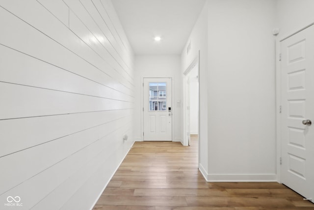 10008 Sundley Dr, Indianapolis, IN 46239 - hallway featuring baseboards, visible vents, and light wood-style flooring