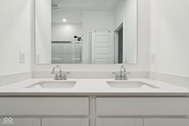10008 Sundley Dr, Indianapolis, IN 46239 - bathroom with double vanity, an enclosed shower, and a sink