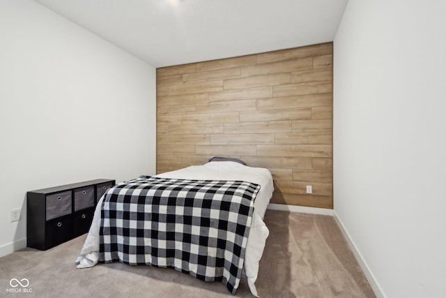 10008 Sundley Dr, Indianapolis, IN 46239 - carpeted bedroom featuring baseboards, wooden walls, and an accent wall