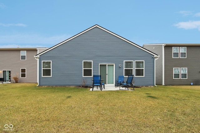 10008 Sundley Dr, Indianapolis, IN 46239 - back of property featuring a patio area and a lawn