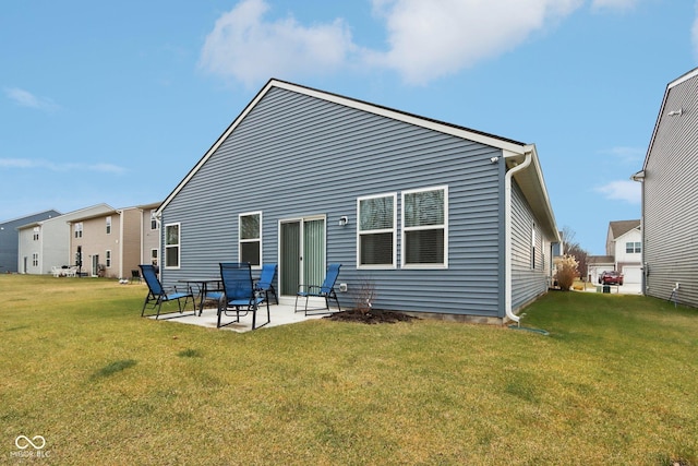 10008 Sundley Dr, Indianapolis, IN 46239 - back of house with a patio and a yard