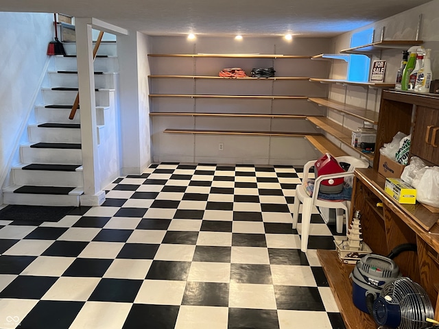 basement with a textured ceiling