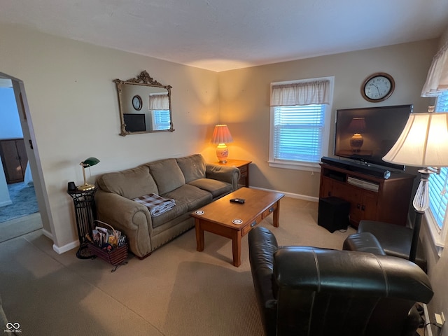 living room with light colored carpet