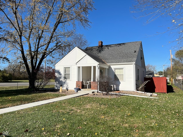 view of front of home with a front lawn