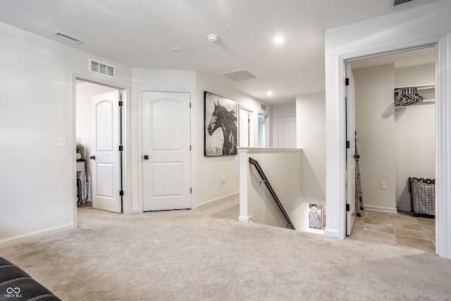 interior space with light colored carpet