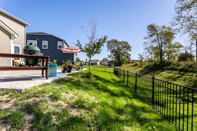 view of yard featuring a wooden deck