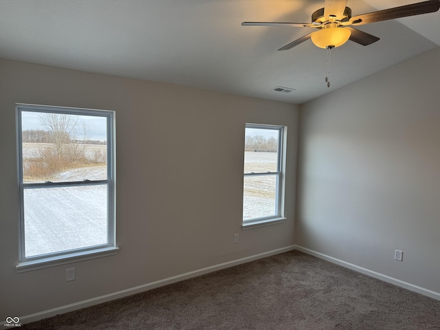 carpeted empty room with ceiling fan