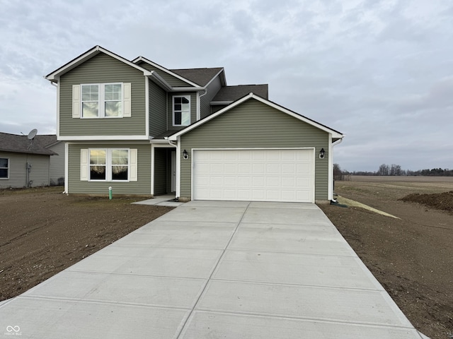 view of front of home with a garage