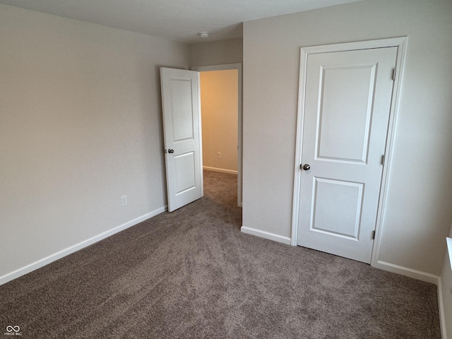 unfurnished bedroom featuring carpet floors