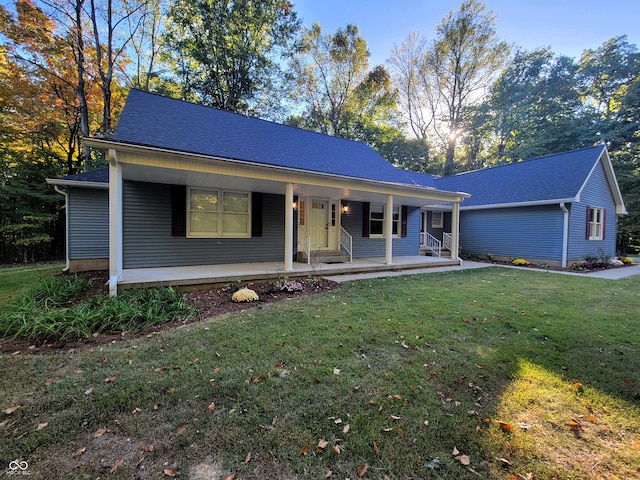 single story home featuring a front lawn and a porch