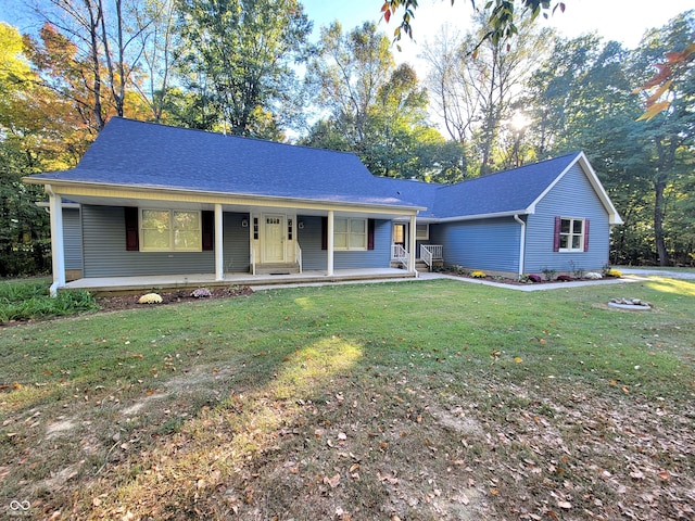 ranch-style home with a front lawn and a porch