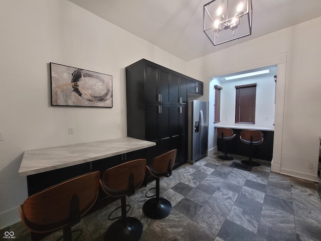 bathroom with an inviting chandelier