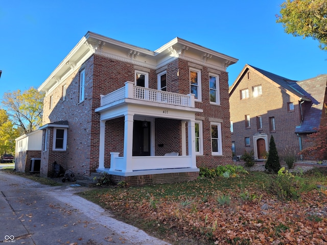 view of front of home with a balcony