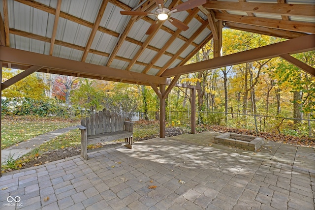 view of patio / terrace featuring a gazebo, a fire pit, and ceiling fan