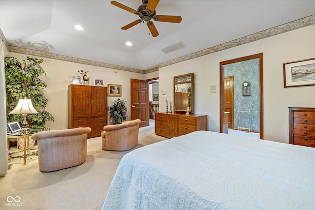 carpeted bedroom with lofted ceiling, a raised ceiling, and ceiling fan