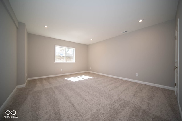 view of carpeted spare room