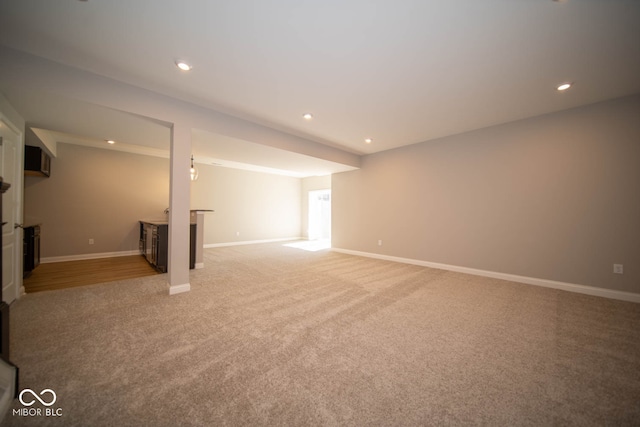 basement with carpet flooring