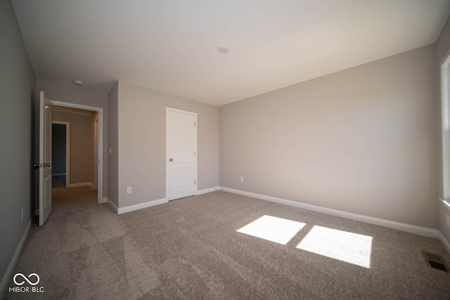 unfurnished bedroom with carpet flooring