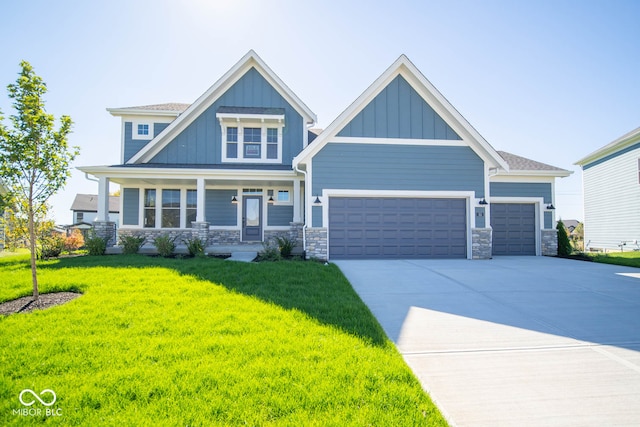 craftsman-style house with a front lawn and a garage