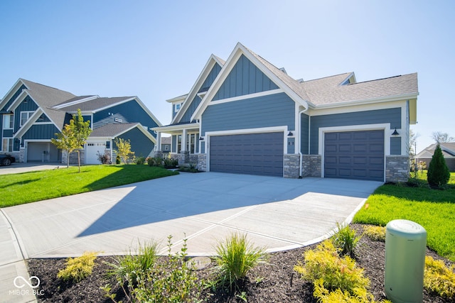 craftsman-style home featuring a front yard