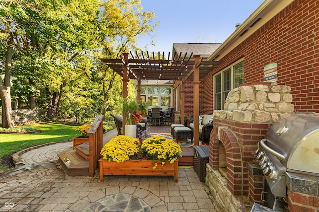 view of patio / terrace with outdoor dining area, a pergola, an outdoor kitchen, and a grill