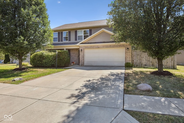 view of front of home with a garage, brick siding, fence, concrete driveway, and a front yard