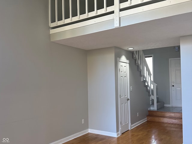 stairway with wood-type flooring