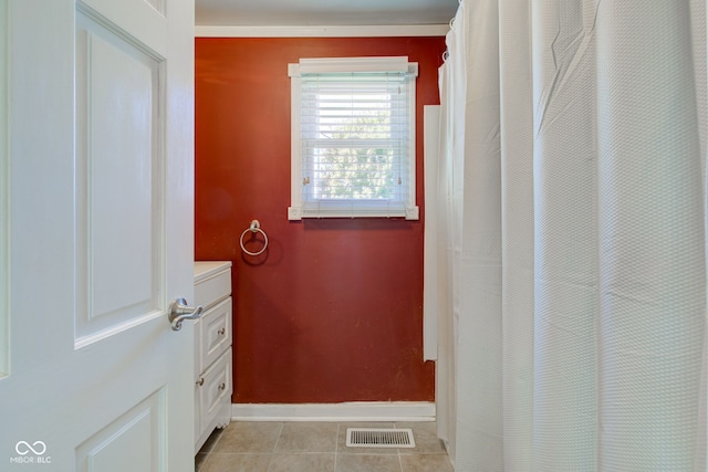 bathroom featuring vanity and tile patterned floors