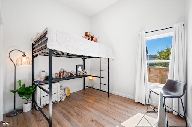 bedroom featuring light wood-type flooring