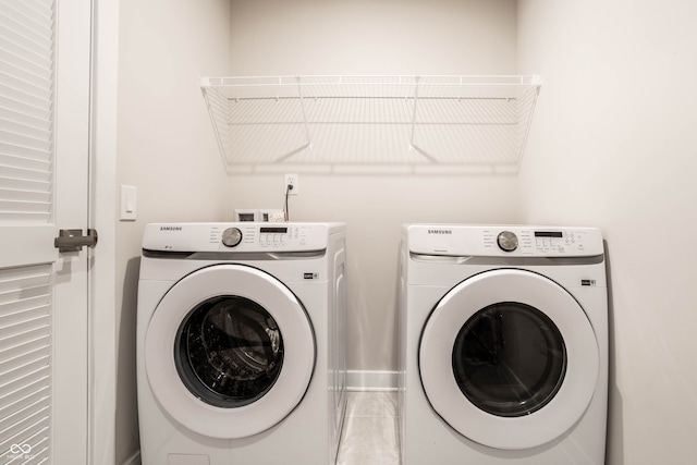 laundry room with washer and dryer