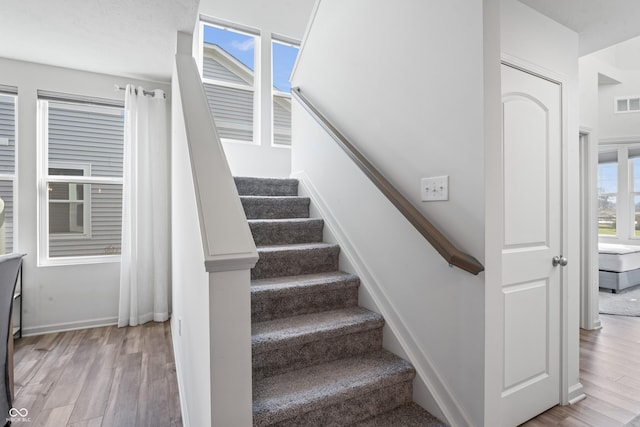 802 Weldon Way, Westfield, IN 46074 - staircase featuring wood finished floors and baseboards