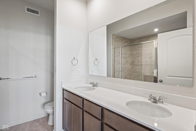 802 Weldon Way, Westfield, IN 46074 - bathroom with double vanity, a tile shower, and tile patterned flooring