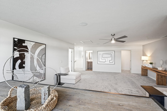 802 Weldon Way, Westfield, IN 46074 - living room featuring a ceiling fan and a textured ceiling