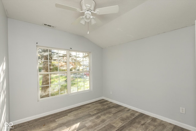 spare room featuring ceiling fan, vaulted ceiling, and hardwood / wood-style flooring