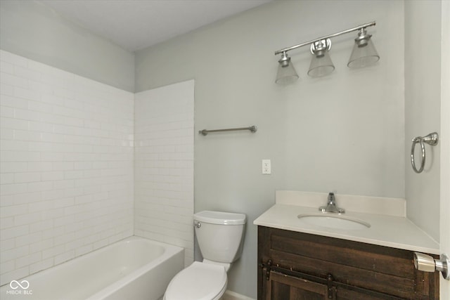 full bathroom featuring vanity, toilet, and tiled shower / bath combo