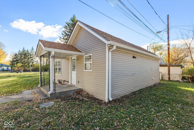 view of property exterior featuring a yard