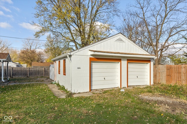 garage with a yard