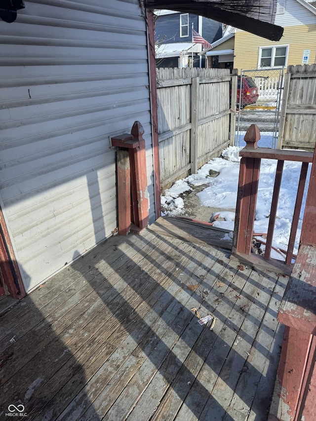 view of snow covered deck