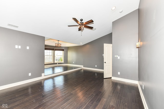 unfurnished room featuring dark hardwood / wood-style floors, ceiling fan, and lofted ceiling