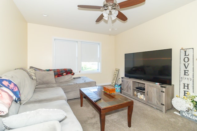 living room featuring ceiling fan and light carpet